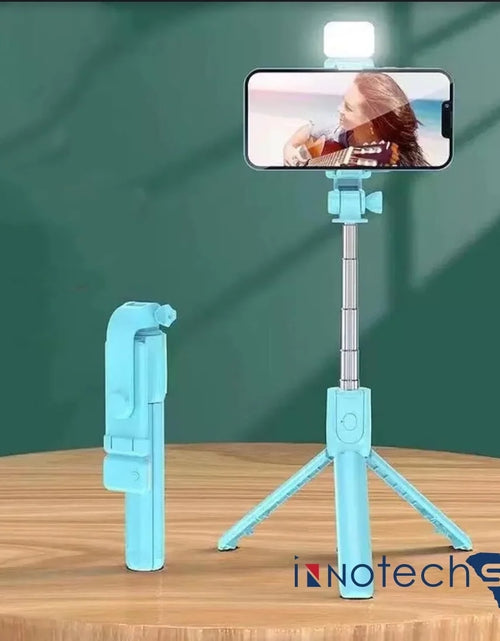 Load image into Gallery viewer, Selfie Stick Tripod with Light, 27&#39;&#39; Selfie Stick with Wireless Remote, Portable Phone Tripod Compatible with Iphone 15 Pro Max/15/14 /13, Samsung Android Smartphone
